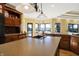 Kitchen island with sink, granite countertop and wood cabinets at 11262 N Everett Rd, Monrovia, IN 46157