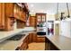 Kitchen features double ovens, wood cabinetry, and granite counters at 11262 N Everett Rd, Monrovia, IN 46157