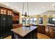 Spacious kitchen with an island, custom cabinetry, and stainless steel appliances at 11262 N Everett Rd, Monrovia, IN 46157