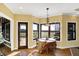 Kitchen nook with a table and chairs and view of the backyard at 11262 N Everett Rd, Monrovia, IN 46157
