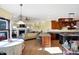 Open kitchen with island, custom cabinetry, and stainless steel appliances at 11262 N Everett Rd, Monrovia, IN 46157