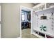 Convenient laundry room with washer, dryer, and built-in cabinets at 11262 N Everett Rd, Monrovia, IN 46157