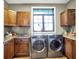 Bright laundry room with ample counter space and cabinets at 11262 N Everett Rd, Monrovia, IN 46157