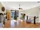 Spacious living room with hardwood floors, a Christmas tree, and fireplace at 11262 N Everett Rd, Monrovia, IN 46157
