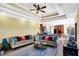 Spacious living room with hardwood floors, two sofas, and an open view to kitchen at 11262 N Everett Rd, Monrovia, IN 46157