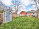 Backyard with storage shed and a view of neighboring houses at 1820 Spann Ave, Indianapolis, IN 46203