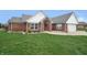 Brick ranch home with a large front yard at 4126 S Black Oak Ln, New Palestine, IN 46163