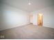 Bright bedroom featuring carpet and access to a bathroom at 5607 Tart Blvd, Indianapolis, IN 46239