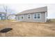 Gray siding and backyard patio at 5607 Tart Blvd, Indianapolis, IN 46239