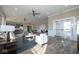 Bright and airy living room with comfortable seating and access to the outdoors at 5607 Tart Blvd, Indianapolis, IN 46239