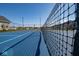 Blue pickleball court with black net at 5607 Tart Blvd, Indianapolis, IN 46239