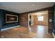 Open living area with hardwood floors and built-ins at 5837 Baron Ct, Indianapolis, IN 46250