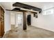 Finished basement offering versatile space with concrete floors and neutral walls at 621 N Denny St, Indianapolis, IN 46201