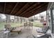 Relaxing screened porch with seating and backyard views at 9415 Thornwood Dr, Indianapolis, IN 46250