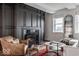 Living room features a modern fireplace and built-in shelving at 110 E Washington St # 900, Indianapolis, IN 46204