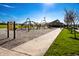 Community playground with modern play structures, perfect for families at 11872 Sage Creek Bnd, Fishers, IN 46037