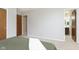 Bedroom with carpet, access to bathroom, and double door closet at 1189 N County Road 475 E, Avon, IN 46123