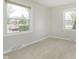 Bright bedroom with neutral walls, carpet, and ample natural light at 1189 N County Road 475 E, Avon, IN 46123