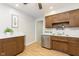 Galley kitchen with wood cabinets and stainless steel appliances at 1189 N County Road 475 E, Avon, IN 46123