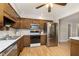 Eat-in kitchen, stainless steel appliances, and wood cabinets at 1189 N County Road 475 E, Avon, IN 46123