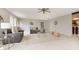 Open living area with gray sofas and a ceiling fan at 1189 N County Road 475 E, Avon, IN 46123