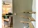 View of living room and corner shelving from a hallway at 2104 N Ball Ave, Muncie, IN 47304