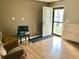 Small home office with hardwood floors and an exterior door at 2104 N Ball Ave, Muncie, IN 47304