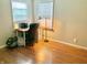 Home office space with a desk, chair, and hardwood floors at 2104 N Ball Ave, Muncie, IN 47304