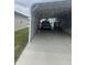 Carport provides covered parking and storage at 2743 Arthur'S Way, Anderson, IN 46011