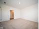 Bright bedroom with neutral carpeting and access to bathroom at 5559 Tart Blvd, Indianapolis, IN 46239