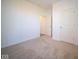 Spacious bedroom with neutral carpeting and an adjacent bathroom at 5559 Tart Blvd, Indianapolis, IN 46239