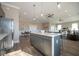 Modern community kitchen with stainless steel appliances and an island at 5559 Tart Blvd, Indianapolis, IN 46239
