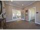 Bright and airy community room with access to other rooms at 5559 Tart Blvd, Indianapolis, IN 46239