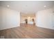 Open dining room with hardwood floors and kitchen views at 5559 Tart Blvd, Indianapolis, IN 46239