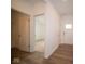 Bright entryway with wood-look floors, leading to additional rooms and a closet at 5559 Tart Blvd, Indianapolis, IN 46239