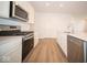 Modern kitchen featuring stainless steel appliances and light cabinetry at 5559 Tart Blvd, Indianapolis, IN 46239