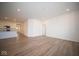 Bright living room with hardwood floors and kitchen access at 5559 Tart Blvd, Indianapolis, IN 46239