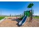Community playground with swings and climbing structure at 5559 Tart Blvd, Indianapolis, IN 46239