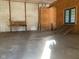 Unfinished barn interior with wooden stairs at 5800 S State Rd 37, Tipton, IN 46072