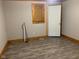 Simple bedroom with wood trim and laminate wood floors at 5800 S State Rd 37, Tipton, IN 46072