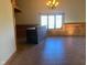 Spacious dining room with wood wall accents and tile floors at 5800 S State Rd 37, Tipton, IN 46072
