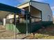 Side view of metal building with green and beige accents at 5800 S State Rd 37, Tipton, IN 46072