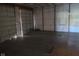 Spacious garage with large overhead doors at 5800 S State Rd 37, Tipton, IN 46072