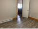 Small office with wood trim and laminate wood floors at 5800 S State Rd 37, Tipton, IN 46072