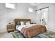 Spacious bedroom with wood bed frame, stylish rug and an ensuite bathroom at 16298 Grand Cypress Dr, Noblesville, IN 46060