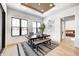 Bright dining area with wooden table, bench seating, and large windows at 16298 Grand Cypress Dr, Noblesville, IN 46060