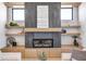 Modern fireplace with a sleek design and built-in shelving at 16298 Grand Cypress Dr, Noblesville, IN 46060
