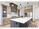Eat-in kitchen with stainless steel appliances and dark-stained cabinetry at 16298 Grand Cypress Dr, Noblesville, IN 46060