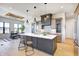 Modern kitchen with large island, stainless steel appliances, and stylish cabinetry at 16298 Grand Cypress Dr, Noblesville, IN 46060