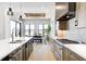 Open concept kitchen with stainless steel appliances and large island at 16298 Grand Cypress Dr, Noblesville, IN 46060
